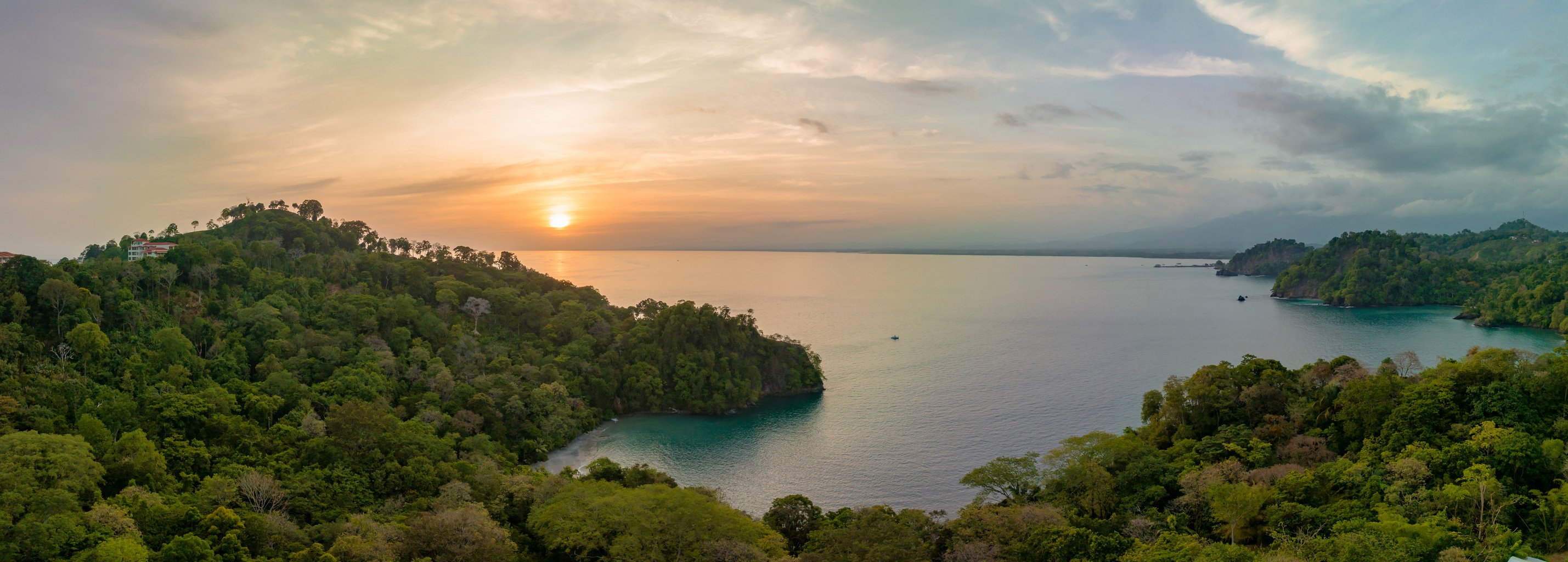 Aerial photo of the Pacific Ocean meeting the beaches & rainforest Costa Rica